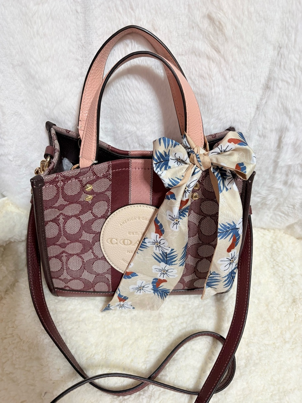 EUC Coach Dempsey Tote 22 in signature jacquard with a prominent circular patch